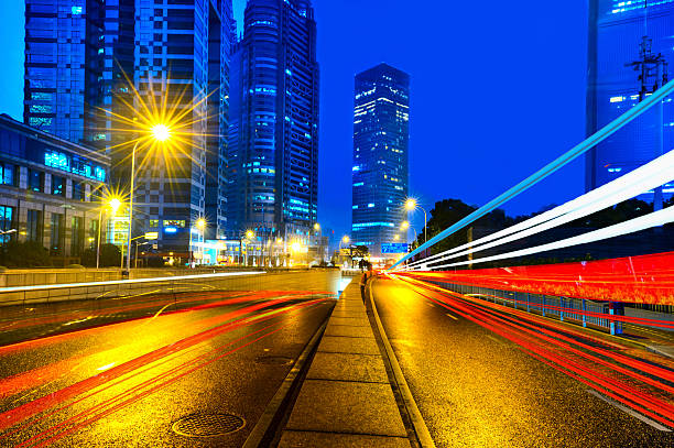 istock light trails on the modern building background in shanghai china 477445493