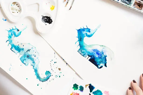 Photo of Watercolor painting of blue seahorse