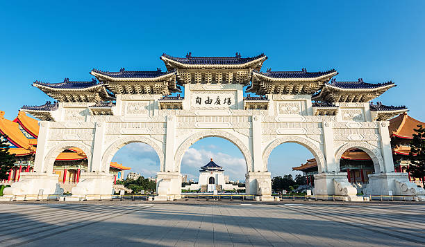 Archway at Liberty Square in Taipei, Taiwan The Chinese archways are located on Liberty Square or Freedom Square (自由廣場 as written on the arches). Famous Chiang Kai-Shek Memorial Hall (Taiwan Democracy Memorial Hall) viewable in the middle of the arches. Liberty Square, Taipei, Taiwan. chiang kai shek photos stock pictures, royalty-free photos & images
