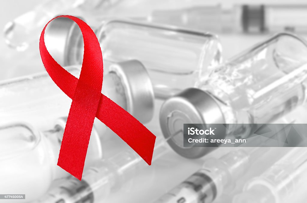 World Aids Day Red Ribbon Sign. World Aids Day Red Ribbon Sign with Vaccine Background. Sign for AIDS - HIV Campaign. 2015 Stock Photo