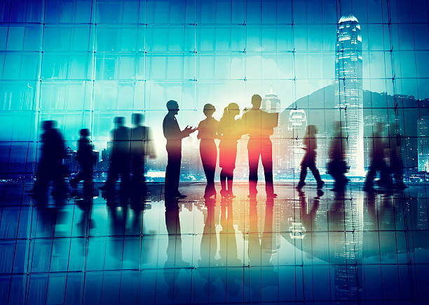 istock Silhouettes of Business People Working 477450336