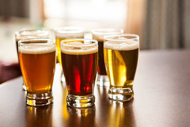 istock Six sample glasses of beer on a bar 477450394