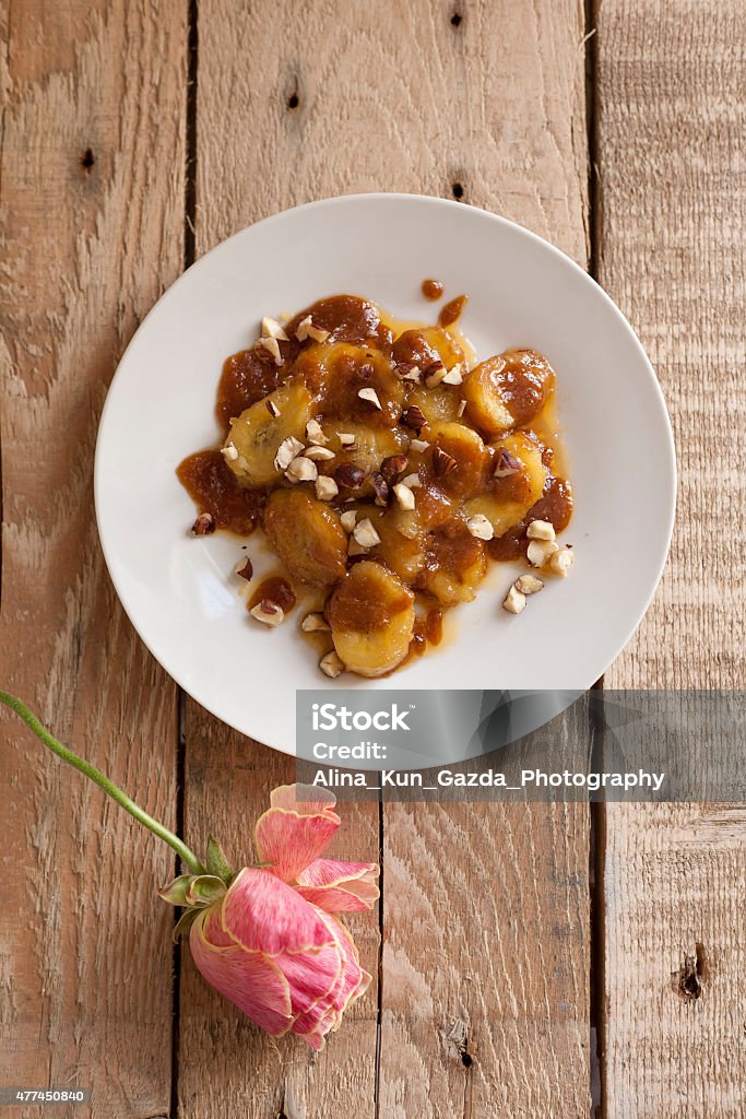 Caramelised banana Caramelised bananas with toffee creme and hazelnuts 2015 Stock Photo