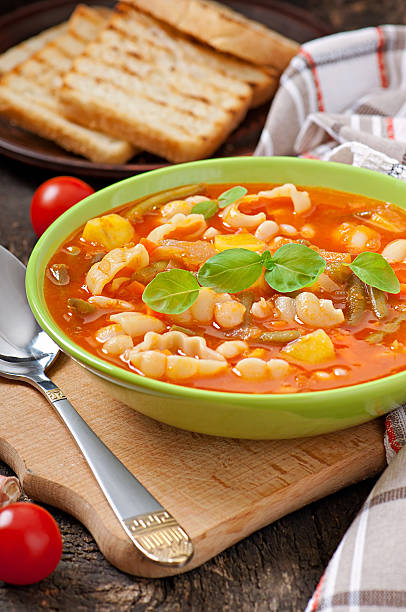 istock Minestrone, italian vegetable soup with pasta 477451267
