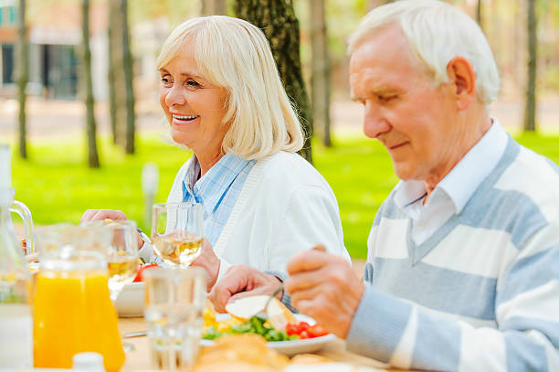 istock Enjoying dinner outdoors. 477451866