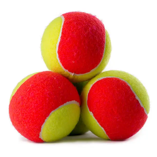 Photo of Three tennis balls on white