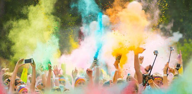 Colorrun competitors in detail of hands stock photo