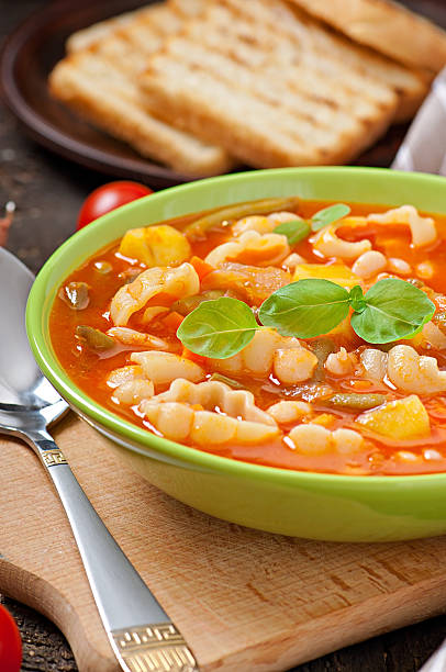 istock Minestrone, italian vegetable soup with pasta 477452241