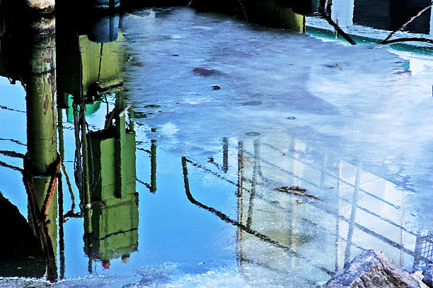 Industry reflections in the water stock photo