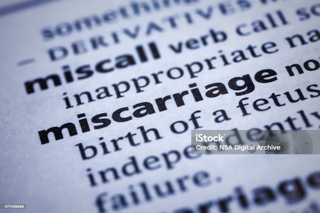 Miscarriage: Dictionary Close-up Miscarriage: Dictionary Close-up. Miscarriage, also known as spontaneous abortion and pregnancy loss, is the natural death of an embryo or fetus before it is able to survive independently. Selective focus and Canon EOS 5D Mark II with MP-E 65mm macro lens. Miscarriage Stock Photo
