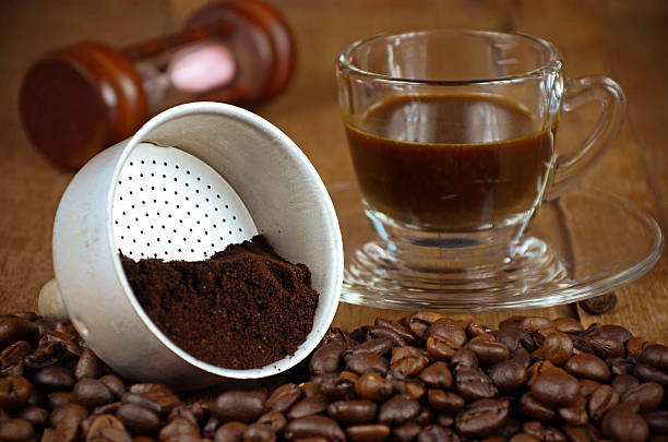 istock Presurize Coffee Filter with Roasted and Grounded Coffee Beans M 477459726