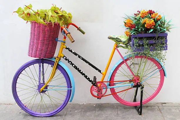 Photo of Old colourful bike with flowers