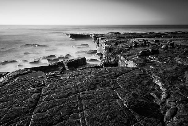 istock Beautiful coastal landscape at sunrise in black and white 477460991