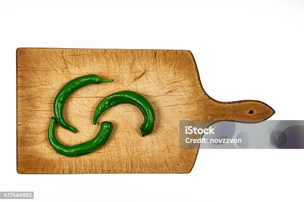 Hot Pepper On Wooden Cutting Board Stock Photo - Download Image Now - 2015, Bright, Chili Pepper