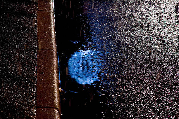 Blue reflections in a puddle stock photo
