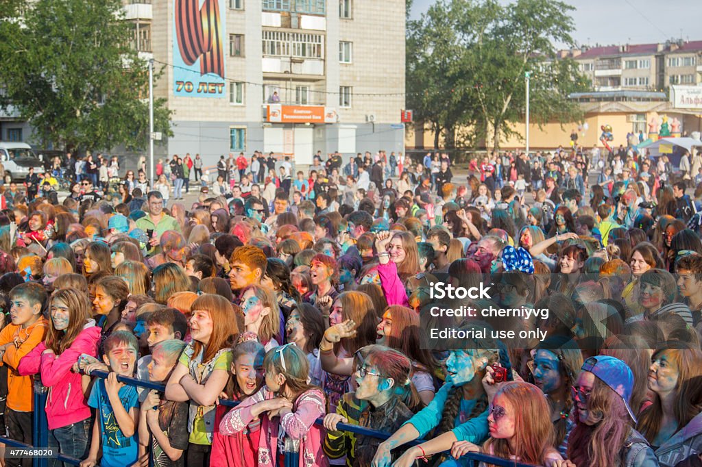 The festival colors Holi, on  Independence Day Russia,  Krasnokamensk Zabaykalsky Krai, Russia - June 12, 2015: The festival colors Holi, on the Independence Day Russia, Krasnokamensk Zabaykalsky Krai. Young people at a festival dedicated to the Day of Independence krasok.Festival Russia 12 June 2015. 2015 Stock Photo