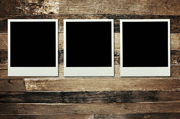 istock Vintage old photo frame on wooden background 477468154