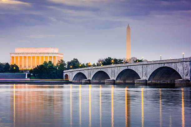 Washington DC Skyline Washington DC, USA skyline on the Potomac River with Lincoln Memorial, Washington Memorial, and Arlington Memorial Bridge. national monument stock pictures, royalty-free photos & images