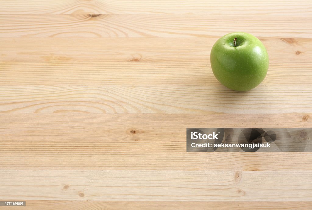 green apple green apple on table wood Agriculture Stock Photo