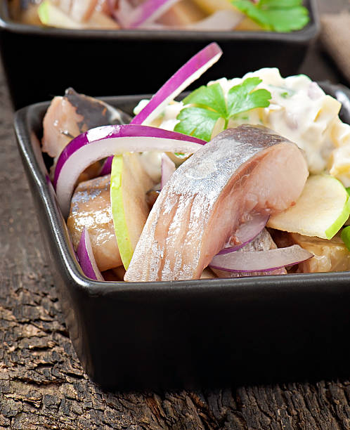 istock Herring salad with onion and green apple 477470311
