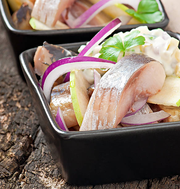 istock Herring salad with onion and green apple 477470313