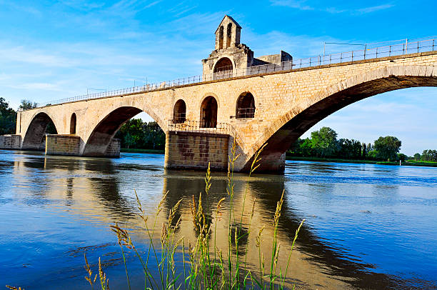 a view of the Pont Saint-Benezet or Pont d'Avignon bridge, in Avignon, France, over the  Rhone River