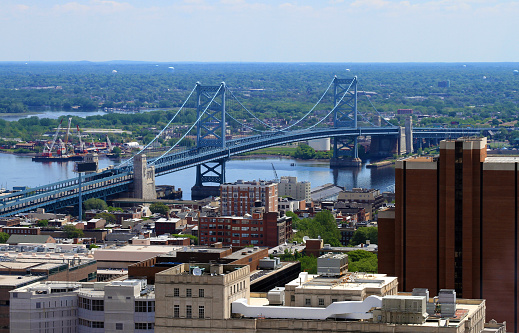 The Ben Franklin Bridge crossing over the Delaware River between Philadelphia, Pennsylvania and Camden, New Jersey.