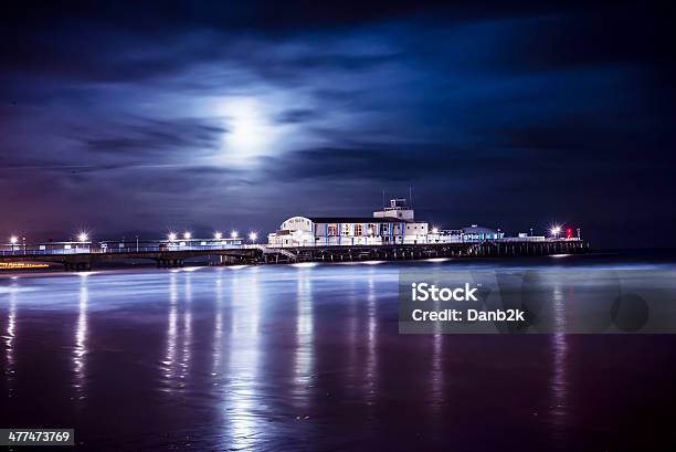 Pier At Night Stock Photo - Download Image Now - Beach, Bournemouth - England, Cloudscape