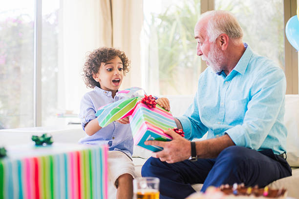istock Three generation family celebrating a birthday in Dubai. 477474416