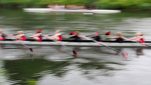 istock Team of Eight Rowing Boat, Motion Blur 477476464