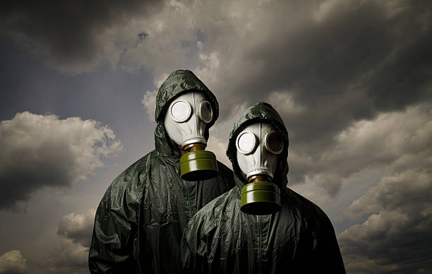 istock Adam and Eve. Gas masks. 477476913