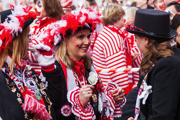 Tuebingen, Germany - February 09, 2020: Swabian Fasnet - Colorful carnival procession on the street of the old town of Tübingen - Swabian-Alemannic Fasnet is a pagan affair with old traditions