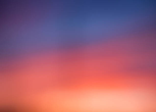 istock Blur background against orange and blue sunset sky. 477485204