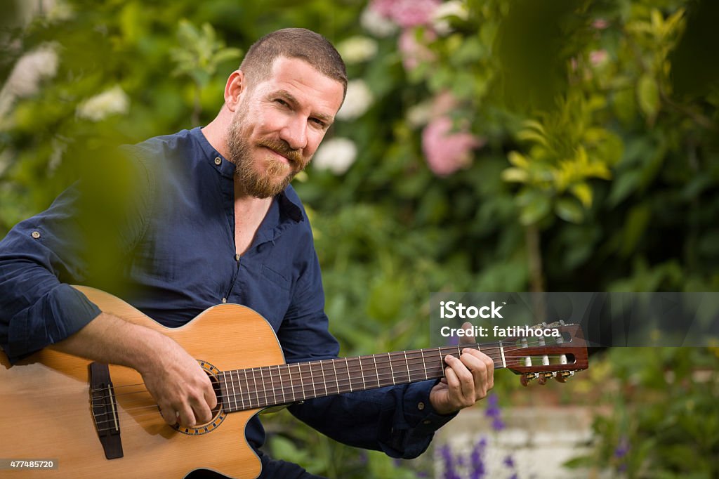 Guitarist Young guitarist playing. 2015 Stock Photo