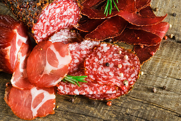 istock Smoked sausage with rosemary and peppercorns 477487621