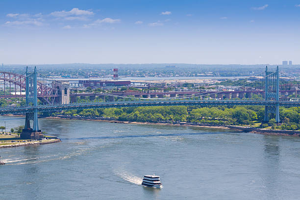 istock East River with Triborough Bridge, Hell Gate Bridge, New York. 477494212