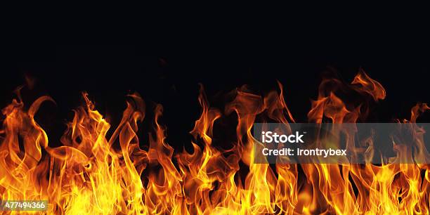 Burning Fire Flame On Black Background Stock Photo - Download Image Now - Flame, Fire - Natural Phenomenon, Hell