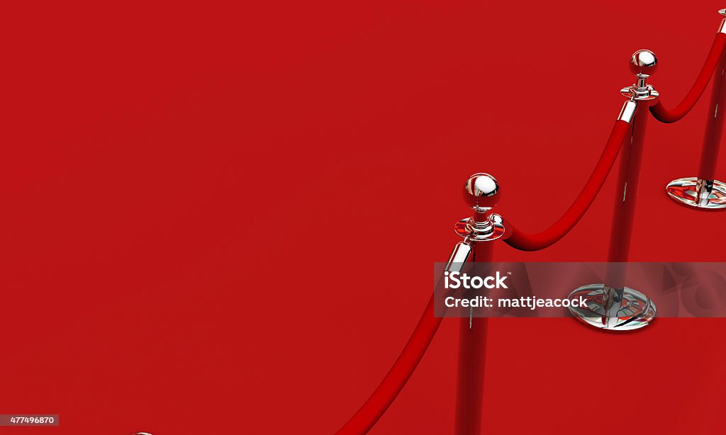 VIP red carpet VIP red carpet and rope barrier against a red background Red Carpet Event Stock Photo