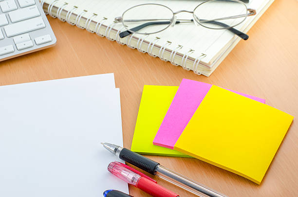 istock Blank paper with pen and color note paper on Computer desk 477498100