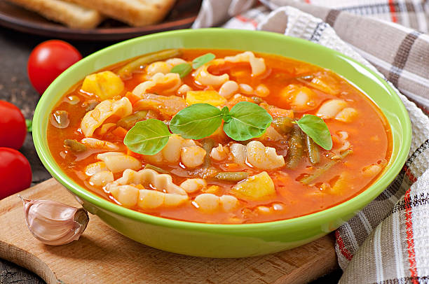 istock Minestrone, italian vegetable soup with pasta 477503379