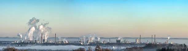 Panoramic view of a chemical plant. Smoke from chimneys.
