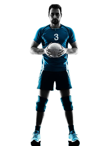 man volleyball silhouette one caucasian man volleyball in studio silhouette isolated on white background male volleyball player stock pictures, royalty-free photos & images
