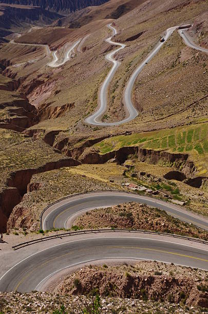 istock Hard and winding mountain road 477506532