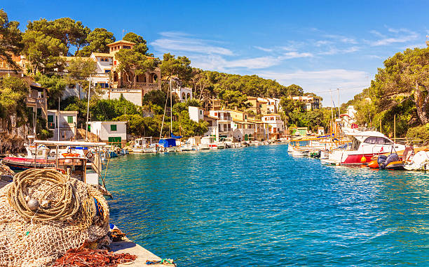 Cala Figuera, Santanyí (Mallorca) Fishing boats and nets in Cala Figuera, a small traditional fishing village located in the district of  Santanyí on the Balearic Islands of Mallorca (Spain). fishing village photos stock pictures, royalty-free photos & images