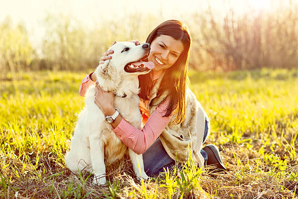 istock Woman with dog 477514431