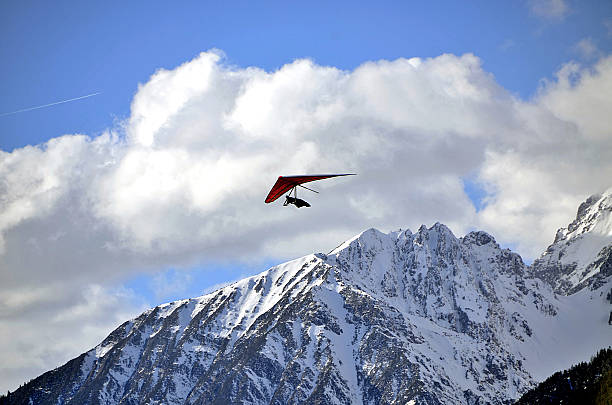 Hang glider just after launch Mieminger Range, Tyrol, Alps, Austria. hang glider stock pictures, royalty-free photos & images
