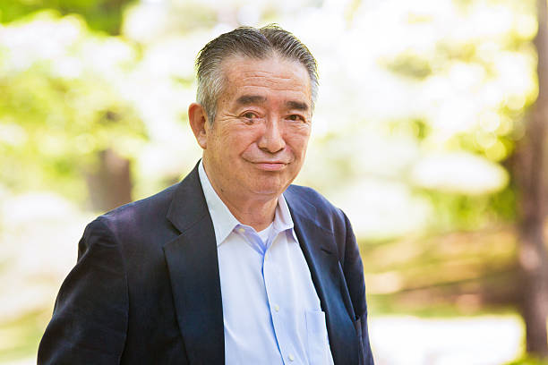 istock Japanese senior man in park making a funny face 477516640
