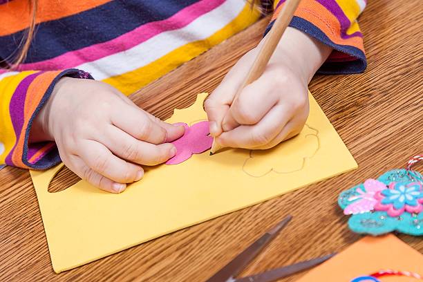 istock Preschool child create shapes and designs for children 477517156