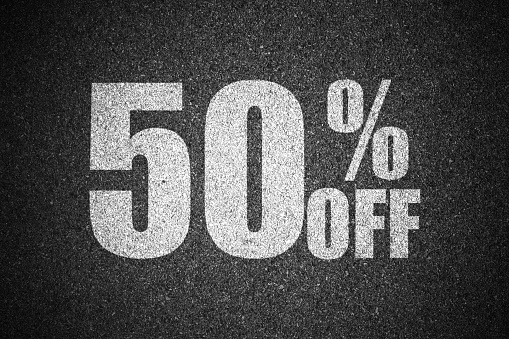 Discount percent sign on asphalt