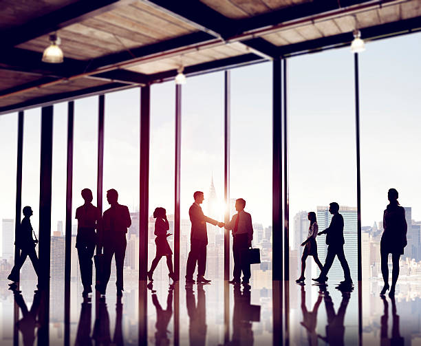 istock Group of Business People in Office Building 477521072